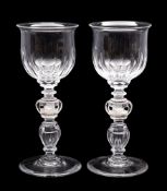 A pair of large wine glasses,