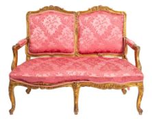 A carved and giltwood and upholstered canapé in Louis XV taste,
