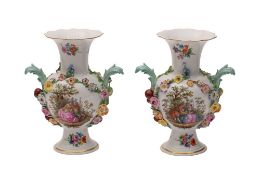 A pair of Meissen flower and fruit encrusted vases of baluster form with acanthus leaf handles,