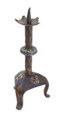 A Limoges enamelled bronze pricket candlestick in early medieval style,