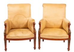 A pair of satinwood and upholstered fauteuils in Louis XVI style,
