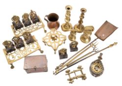 A mixed collection of brass and copper wares including;- candlesticks, trivets, horse brasses,