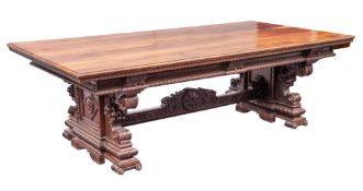A fine and substantial Italian walnut centre or dining table in Renaissance style,