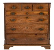 A Regency oak chest of drawers, early 19th century; the top with reeded edges,