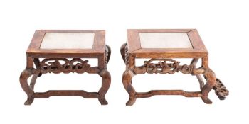Two Chinese hardwood stands of square outline, raised on curved legs linked by stretchers, 16.