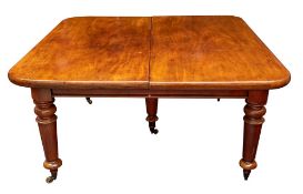 A Victorian mahogany extending dining table,