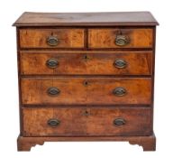 A late George II or George III walnut chest of drawers, circa 1760; the top with moulded edges,