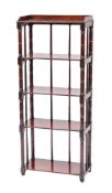 A Regency mahogany etagere or open bookcase,