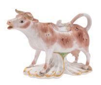 A Stevenson & Hancock Derby [King Street] cow creamer and cover: of conventional form on fluted