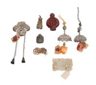 A small carved and pierced jade panel with dragon decoration and seal,