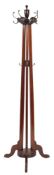 A Victorian mahogany and metal mounted hall stand of club size, in Aesthetic Movement taste,