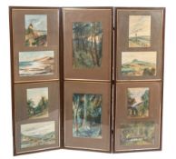 An oak three fold screen with inset watercolour studies of landscapes:,