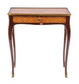 A Continental walnut marquetry petite bureau plat in Louis XV taste,