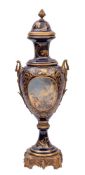 A large Sèvres-style gilt-metal mounted earthenware vase and cover decorated with panels of