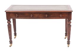 A Victorian mahogany library writing table, in the manner of Gillow,