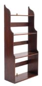 A set of late George III mahogany waterfall wall shelves,