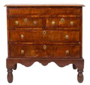 A walnut and crossbanded chest on stand,