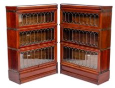 An Edwardian mahogany and glazed corner twin bookcase, by Globe Wernicke,