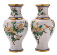 A large pair of Chinese cloisonne vases of ovoid form with prunus blossom,