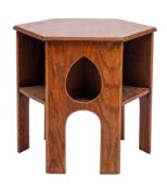 An oak book table in Arts and Crafts style, by Liberty & Co.