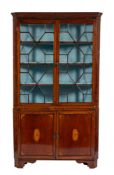 A George III mahogany and line inlaid corner display cabinet,