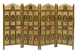 A north west Indian carved and painted wood double sided four leaf room screen,