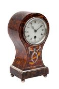 An Edwardian tortoiseshell and silver inlaid clock,