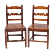A pair of George III stained hardwood side chairs,