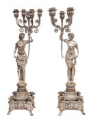 WITHDRAWN A pair of plated metal figural five light standard candelabra in Louis XVI taste,