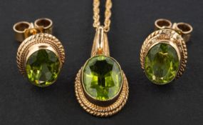 A 9ct gold, oval, mixed-cut peridot pendant and pair of ear studs,