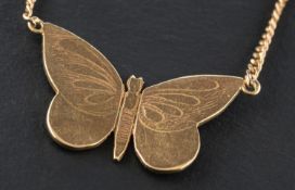 A 9ct gold butterfly necklace, with hallmarks for London 1979, on a curb-link chain, stamped '375',