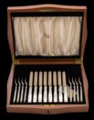 A set of eight George VI silver and m.o.p.