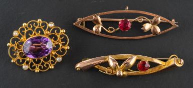 Three openwork, gem-set brooches, including an amethyst and seed pearl brooch,