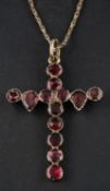 An early 19th century, foil backed garnet, cruciform pendant, length (exl jump ring) ca. 3.