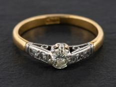A single and round, brilliant-cut diamond ring, estimated weight of principal diamond ca. 0.