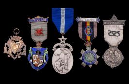 A collection of two silver and enamel and three silver Masonic jewels, some boxed.