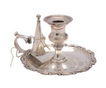 A William IV silver chamber stick and snuffer, maker William Theobalds, London, 1834 crested,