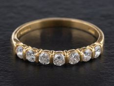 An 18ct gold, round, brilliant-cut diamond, half-eternity ring, estimated total diamond weight ca.