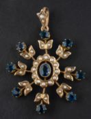 A seed pearl and probably blue topaz and sapphire pendant, stamped '9C', total length ca. 4.