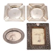 A pair of Elizabeth II silver ashtrays, maker Viners Ltd, Sheffield, 1955 initialled,