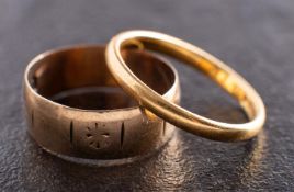 Two gold band rings, including a 22ct gold ring, with hallmarks for London, 1939,