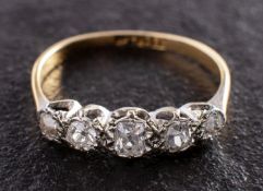 An old and cushion-cut diamond, five stone ring, total estimated diamond weight ca. 0.