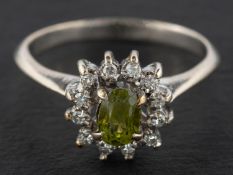 A peridot and single-cut diamond cluster ring, estimated weight of peridot ca. 0.