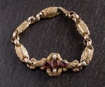 A Victorian, fancy-link, foil backed garnet,