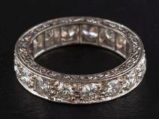 A round, brilliant-cut diamond full eternity ring, total estimated diamond weight ca. 1.