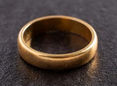 An 18ct gold band ring, with hallmarks for London, 1969, ring size J, total weight ca. 3.5gms.