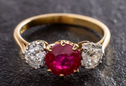 A ruby and old-cut diamond three-stone ring, estimated ruby weight ca. 1.