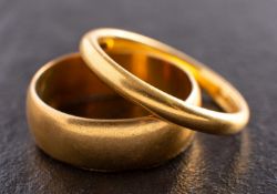 Two 22ct gold band rings, including a ring with hallmarks for London, 1950,