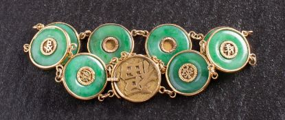 A bracelet of jade plaques, depicting auspicious Chinese characters, stamped '18', length ca.
