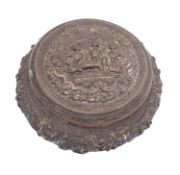 A Burmese silver jar and cover of circular form with repousse decoration of figures in interiors,